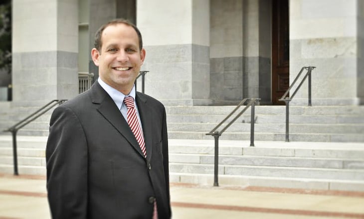 Michael Abrate In Front of Building