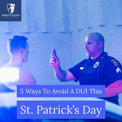Photo of a police office administering a DUI sobriety test with the text “5 ways to avoid a DUI this St. Patrick’s Day