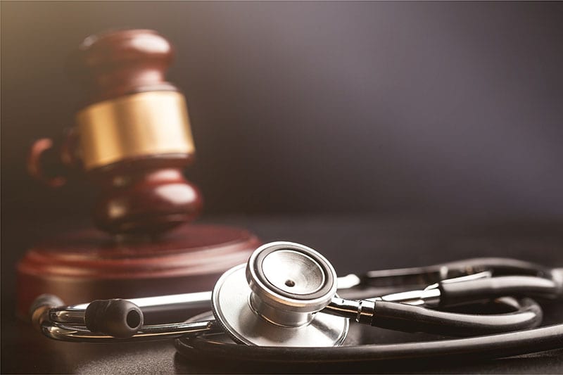 Photo of a stethoscope and gavel