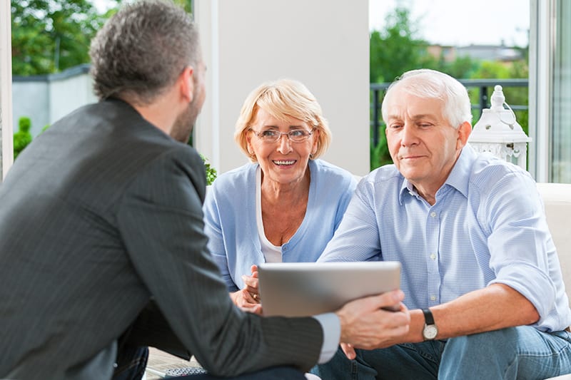 Senior Couple talking to an attorney deciding to separate forms for financial and health