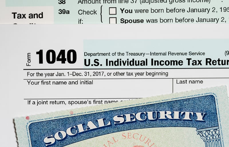 Photo of a social security card and 1040 tax form